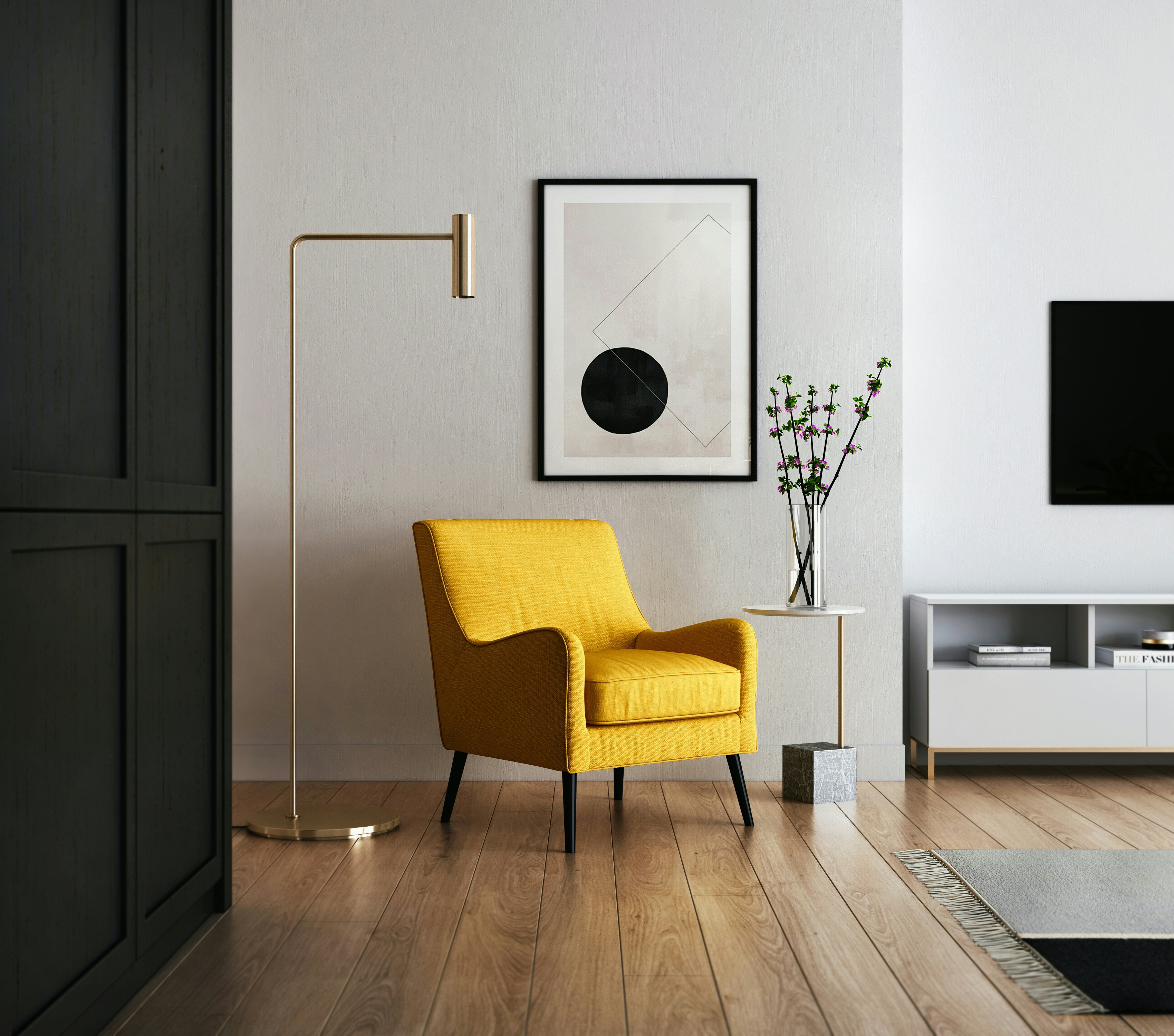 Modernes Wohnzimmer mit gelbem Sessel, minimalistischem Dekor und Holzböden. Wohnen mit allen Sinnen.