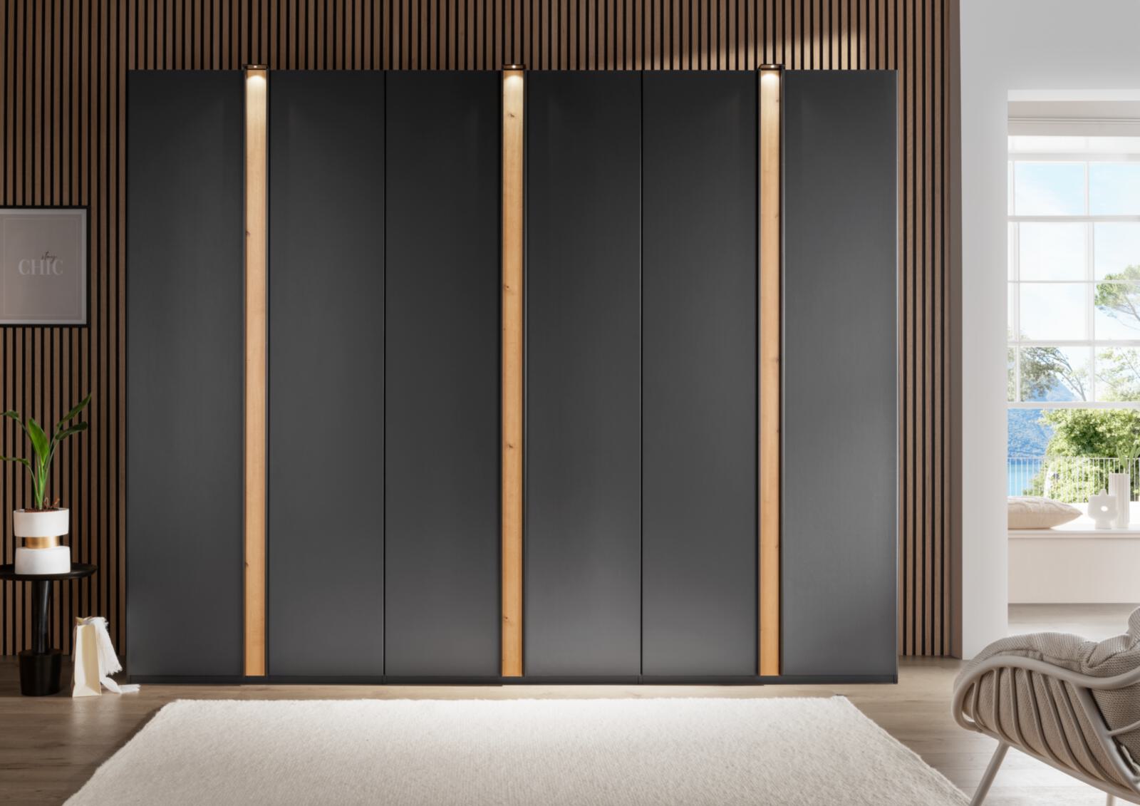 Modern kitchen with minimalist design, featuring sleek cabinets and a central island.